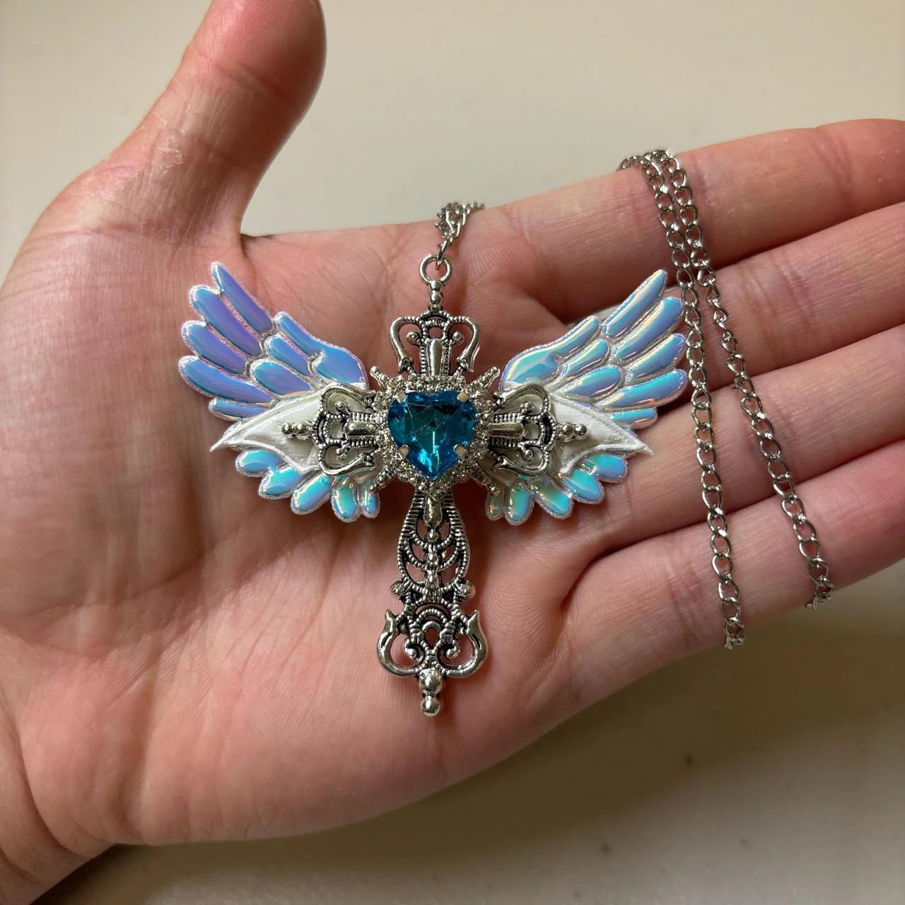 Winged Cross Blue Crystal Necklace - Image 2
